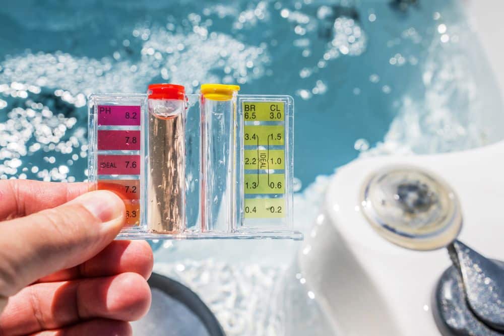 Pool water test kit in hand - Valley Pool and Spa talks about pool water testing.
